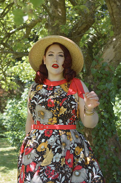 Fit and size review by plus size pinup Miss Amy May of the Eliana-Coral dress gifted by Miss Candyfloss