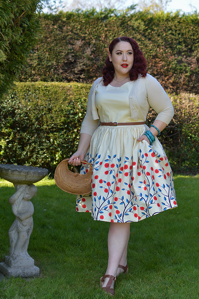 Plus size pinup Miss Amy May modelling the Candice Danube floral swing dress gifted by Collectif Clothing for a fit and size review