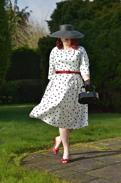Plus size pinup Miss Amy May models the Black and white Polka dot Janet Beatrix dress by Dolly & Dotty for a fit and size review