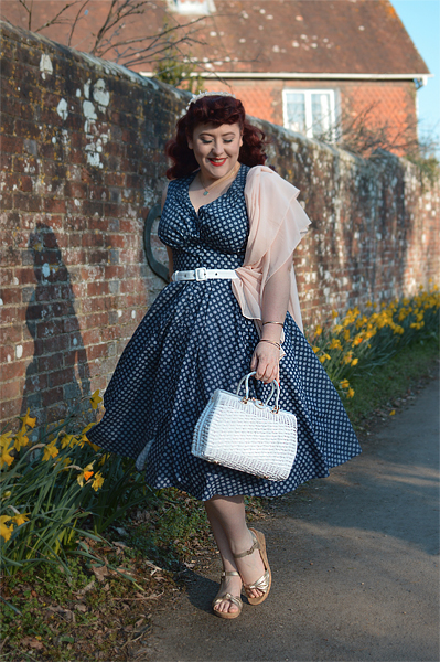 Plus size pinup Miss Amy May models the Khloe-Lee dress and Lizia-Lee Lydia-Lee blazer by Miss Candyfloss for a fit and size reciew