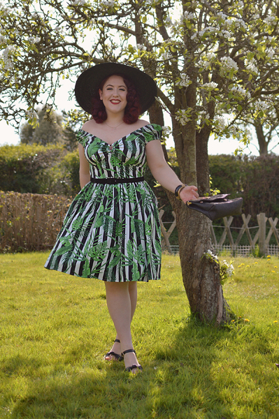 Plus size pinup Miss Amy May models the Solana Mid dress by Hell Bunny for a fit and size review