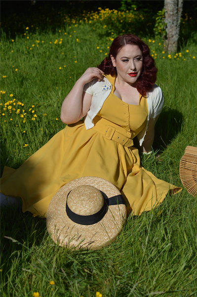 Plus size pinup Miss Amy May models the Selena-Sun dress by Miss Candyfloss for a fit and size review