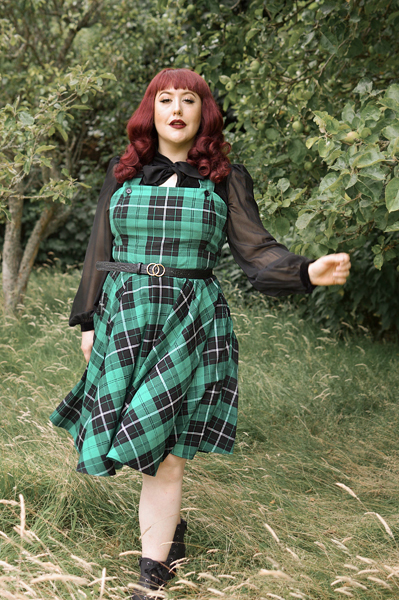 Plus size pinup Miss Amy May models the Beryl pinafore dress by Hell Bunny for a fit and sizing review