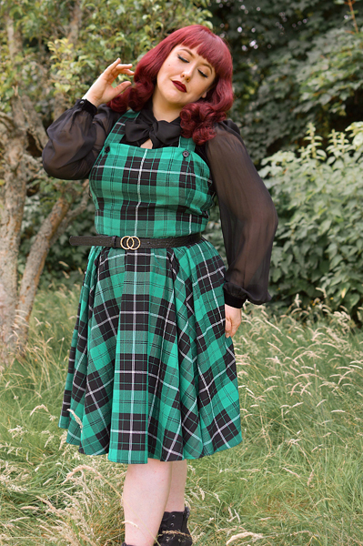 Plus size pinup Miss Amy May models the Beryl pinafore dress by Hell Bunny for a fit and sizing review