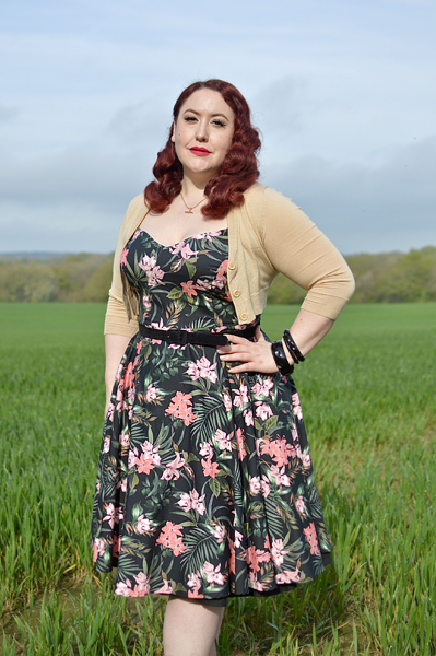 Plus size pinup Miss Amy May models the Calypso dress by Hell Bunny for a fit and sizing review